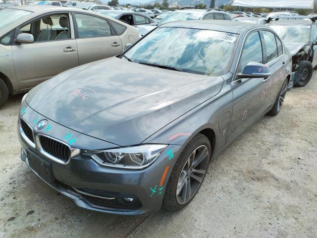 WBA8E1C58JA159620 - 2018 BMW 330E GRAY photo 2