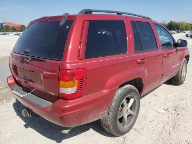 1J4GW58N72C112722 - 2002 JEEP GRAND CHER RED photo 4