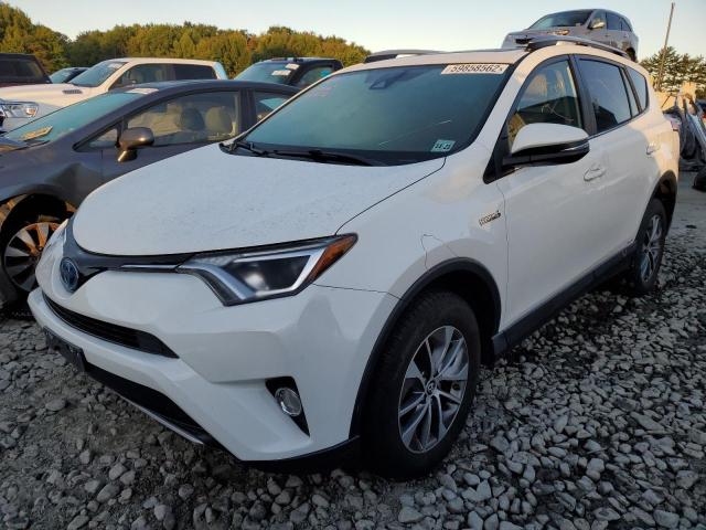 JTMRJREV6JD251080 - 2018 TOYOTA RAV4 HV LE WHITE photo 2