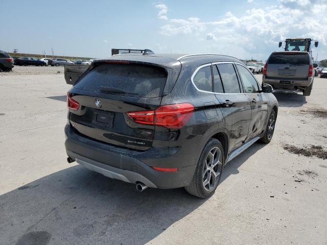 WBXHU7C34J5L06972 - 2018 BMW X1 SDRIVE2 BLACK photo 4