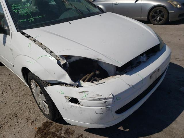 1FAFP34Z74W144167 - 2004 FORD FOCUS SE C WHITE photo 9