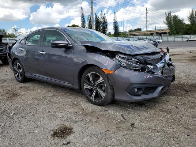 2HGFC1F95HH658712 - 2017 HONDA CIVIC TOUR GRAY photo 1