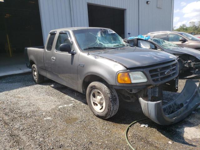 2FTRX17224CA95630 - 2004 FORD F-150 HERI GRAY photo 1