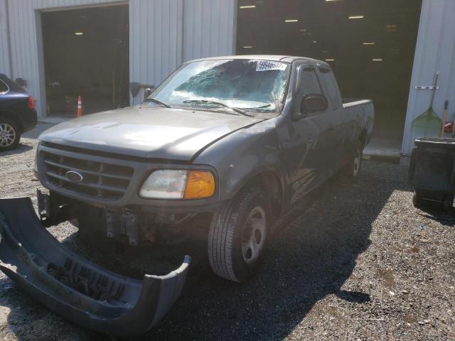 2FTRX17224CA95630 - 2004 FORD F-150 HERI GRAY photo 2