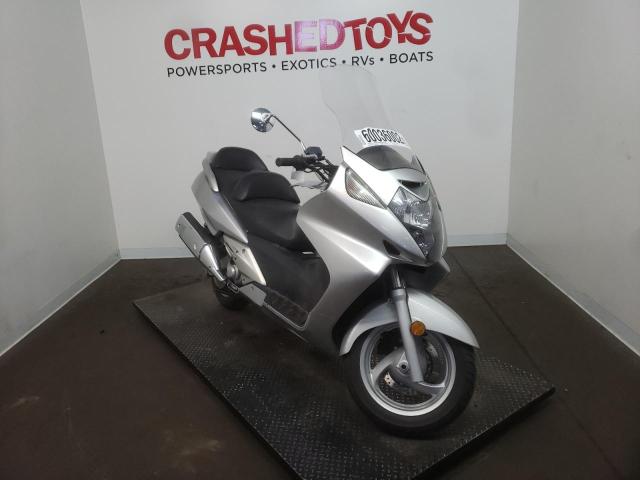 JH2PF01164K200807 - 2004 HONDA FSC600 D SILVER photo 1