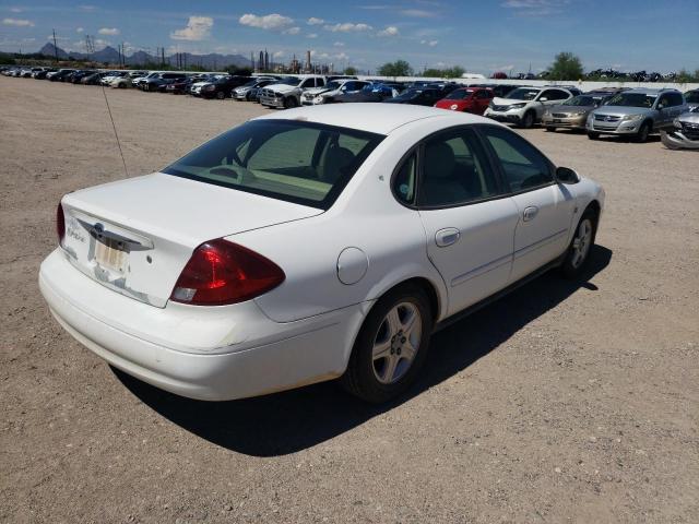 1FAFP56S4YG127001 - 2000 FORD TAURUS LX WHITE photo 4