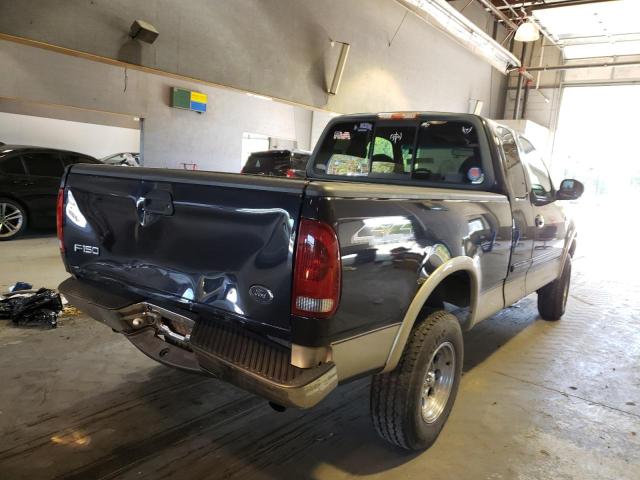 1FTRX18L2YNA76762 - 2000 FORD F150 BLUE photo 4