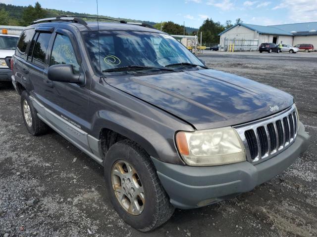 1J4GW58S7XC669952 - 1999 JEEP GRAND CHER GRAY photo 1