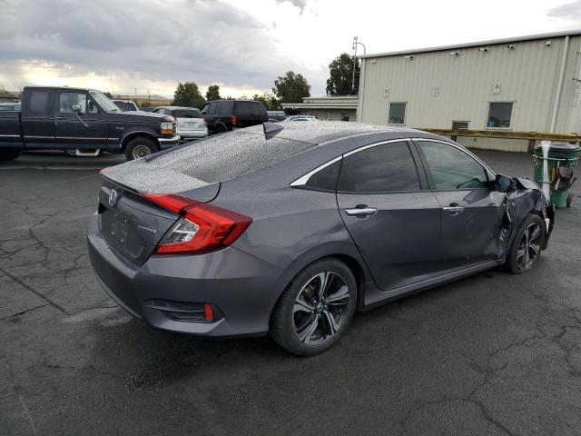 2HGFC1F97HH652779 - 2017 HONDA CIVIC TOUR GRAY photo 4