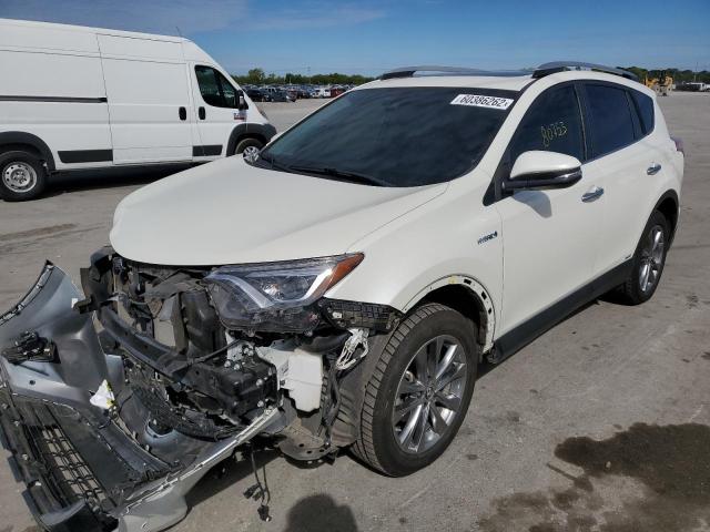 JTMDJREVXJD156001 - 2018 TOYOTA RAV4 HV LI WHITE photo 2