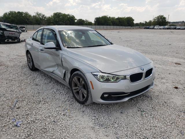 WBA8E1C55JA180151 - 2018 BMW 330E Արծաթագույն լուսանկար 1