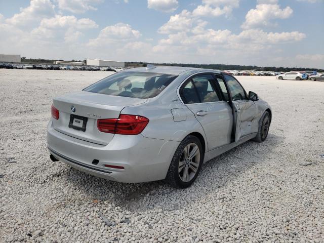 WBA8E1C55JA180151 - 2018 BMW 330E Արծաթագույն լուսանկար 4