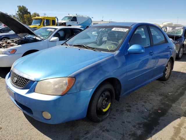 KNAFE122755141638 - 2005 KIA SPECTRA LX BLUE photo 2