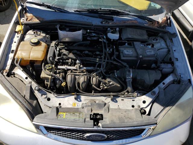 1FAHP34N97W338578 - 2007 FORD FOCUS ZX4 SILVER photo 7