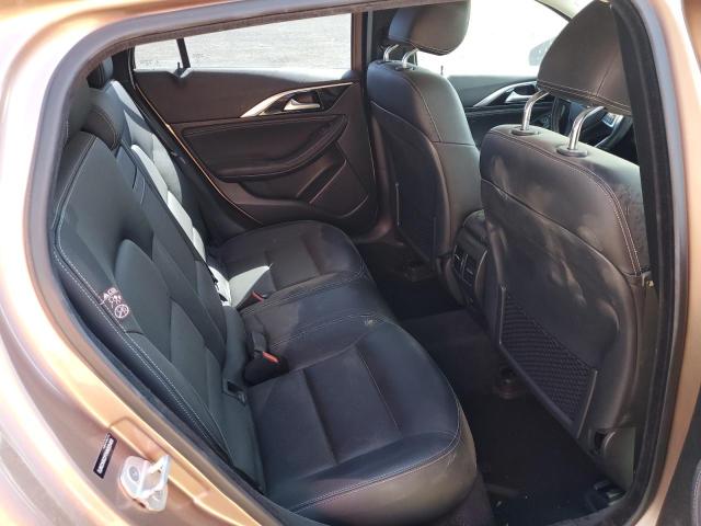 SJKCH5CP7HA020468 - 2017 INFINITI QX30 BASE TAN photo 6