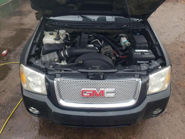 1GKET63M282171819 - 2008 GMC ENVOY DENA BLACK photo 7