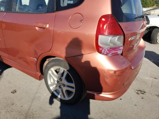 JHMGD38677S021048 - 2007 HONDA FIT S ORANGE photo 9