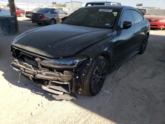 WBA13AW09NFM22570 - 2022 BMW M440XI GRA GREEN photo 2