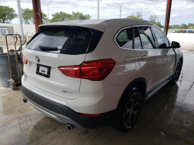 WBXHU7C55K5L10239 - 2019 BMW X1 SDRIVE2 WHITE photo 4