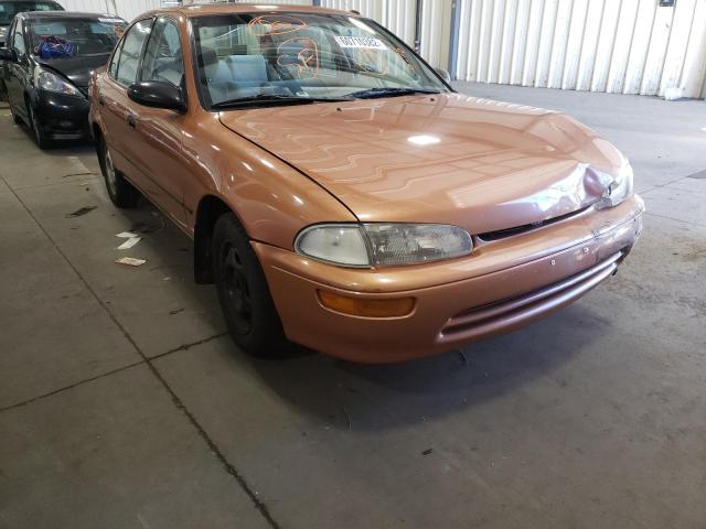 1Y1SK5260VZ445676 - 1997 GEO PRIZM BASE ORANGE photo 1