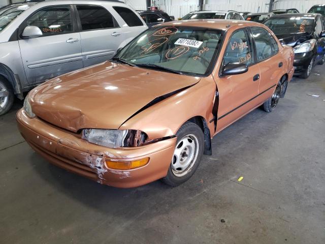 1Y1SK5260VZ445676 - 1997 GEO PRIZM BASE ORANGE photo 2