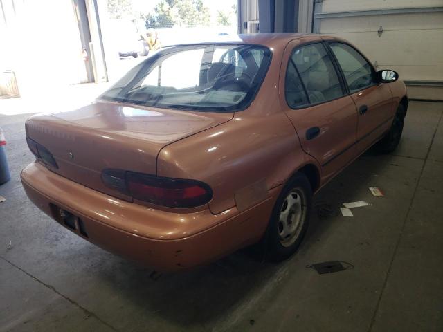 1Y1SK5260VZ445676 - 1997 GEO PRIZM BASE ORANGE photo 4