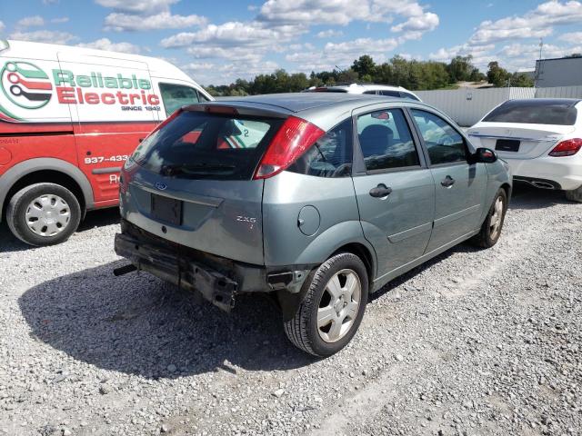 3FAFP37N35R161352 - 2005 FORD FOCUS ZX5 GRAY photo 4