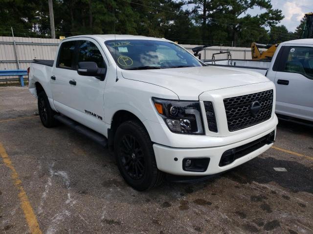 1N6AA1E51KN534591 - 2019 NISSAN TITAN SV WHITE photo 1