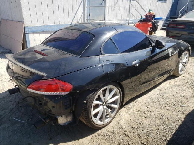 WBALM7C56BE382703 - 2011 BMW Z4 SDRIVE3 BLACK photo 4