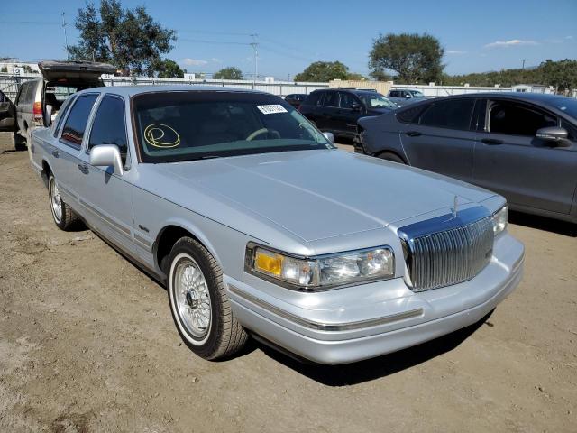 1LNLM82W3VY641066 - 1997 LINCOLN TOWN CAR S SILVER photo 1