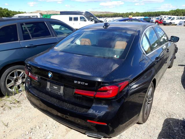 WBA33AG02MCF95714 - 2021 BMW 530XE BLACK photo 4