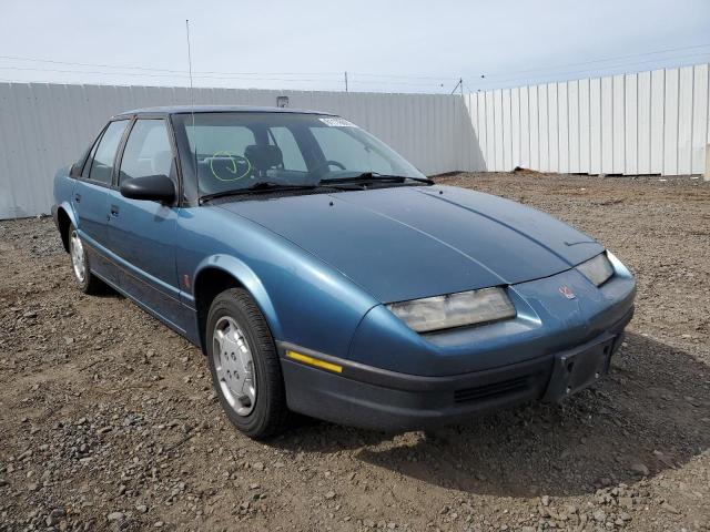 1G8ZH5491NZ200937 - 1992 SATURN SL1 GREEN photo 1