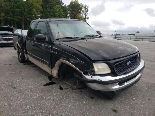 1FTDX1768VND10808 - 1997 FORD F 150 BLACK photo 1