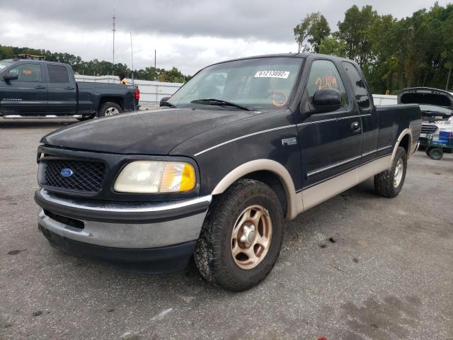 1FTDX1768VND10808 - 1997 FORD F 150 BLACK photo 2