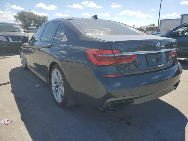 WBA7F0C52GGL99562 - 2016 BMW 750 I GRAY photo 3