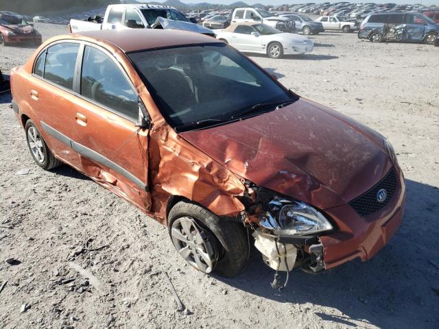 KNADE223896497831 - 2009 KIA RIO BASE ORANGE photo 1