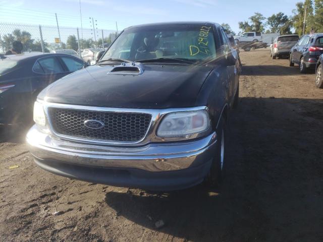 2FTRX17224CA73532 - 2004 FORD F-150 HERI BLACK photo 2