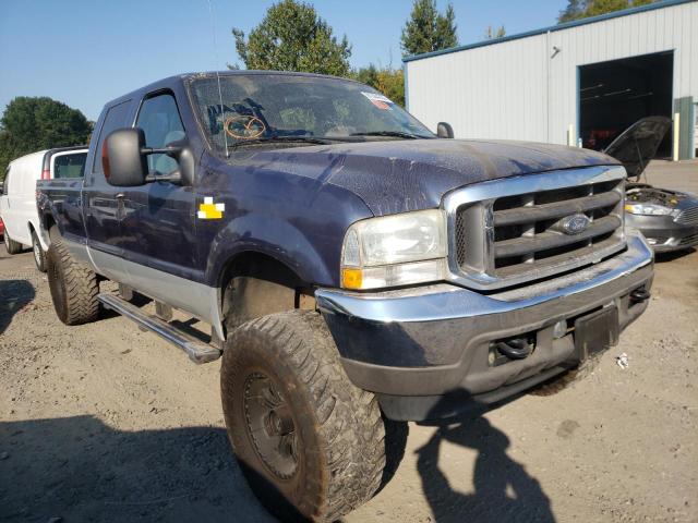 1FTSW31P64EC75935 - 2004 FORD F350 SRW S BLUE photo 1