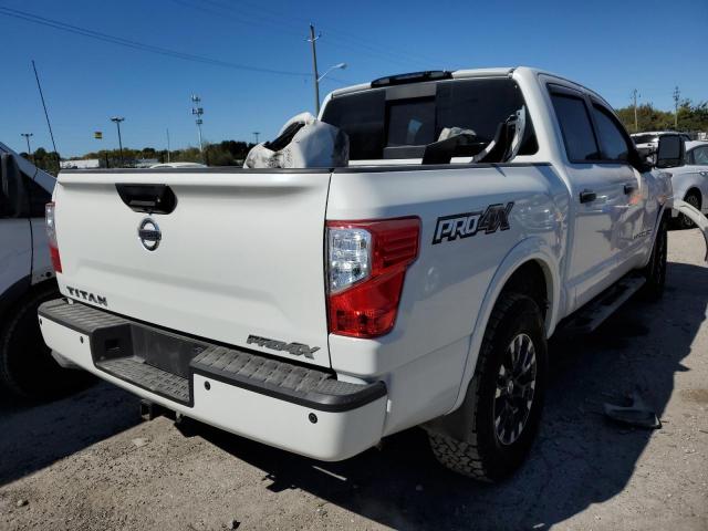 1N6AA1E55JN539842 - 2018 NISSAN TITAN SV WHITE photo 4