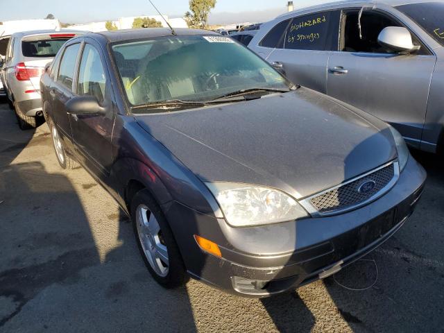 1FAHP34N37W361984 - 2007 FORD FOCUS GRAY photo 1