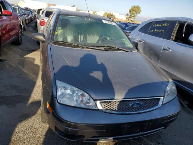 1FAHP34N37W361984 - 2007 FORD FOCUS GRAY photo 9