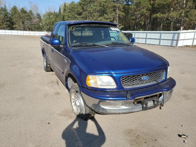 1FTDX1865VKA59732 - 1997 FORD F150 BLUE photo 9