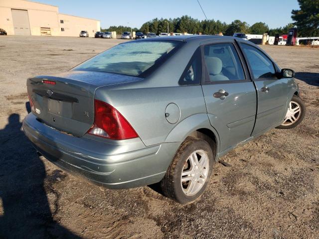 1FAFP34P53W202077 - 2003 FORD FOCUS BLUE photo 4