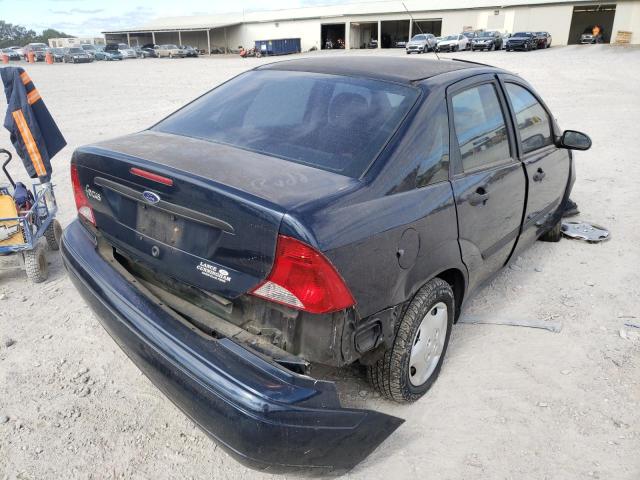 1FAFP33P43W315696 - 2003 FORD FOCUS LX BLUE photo 4