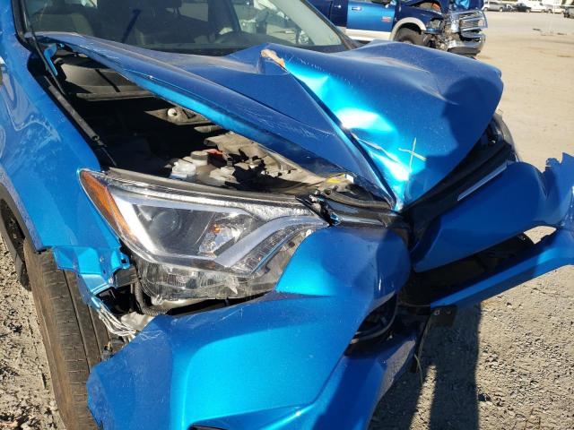 JTMRJREV5JD192605 - 2018 TOYOTA RAV4 HV LE BLUE photo 9