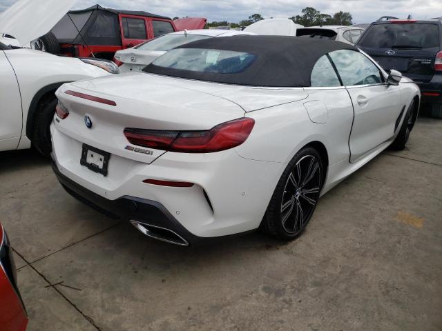 WBAFY4C52KBX39215 - 2019 BMW M850XI WHITE photo 4