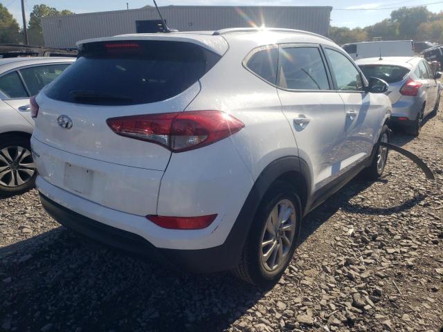 KM8J33A46GU110869 - 2016 HYUNDAI TUCSON LIM WHITE photo 4