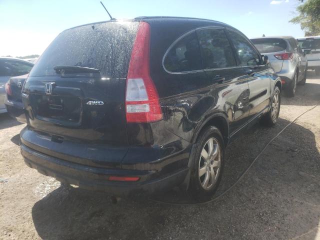 5J6RE4H35AL055262 - 2010 HONDA CR-V LX BLACK photo 4