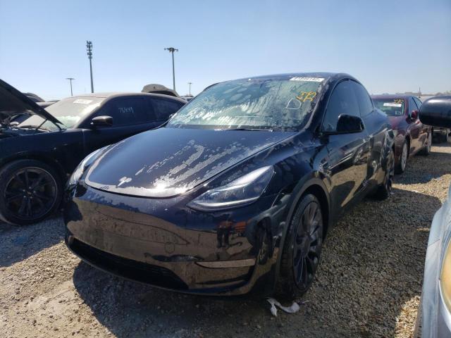 7SAYGDEF9NF307228 - 2022 TESLA MODEL Y أسود صورة 2