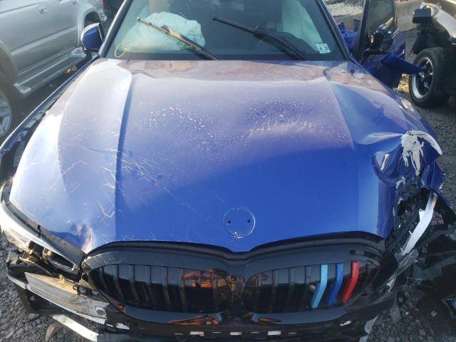 3MW5R7J09L8B13259 - 2020 BMW 330XI BLUE photo 7